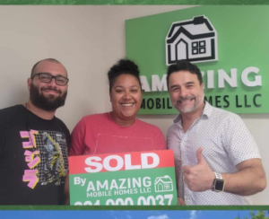 happy couple amazing mobile home homeowners with sales agent