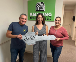homeowners couple with amazing mobile home sales agent