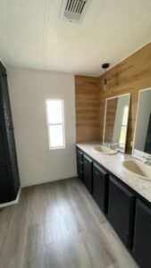 Bathroom wih double white sink